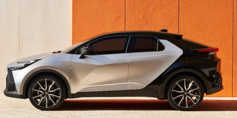 A gray 2023 Toyota C-HR subcompact SUV is parked. 