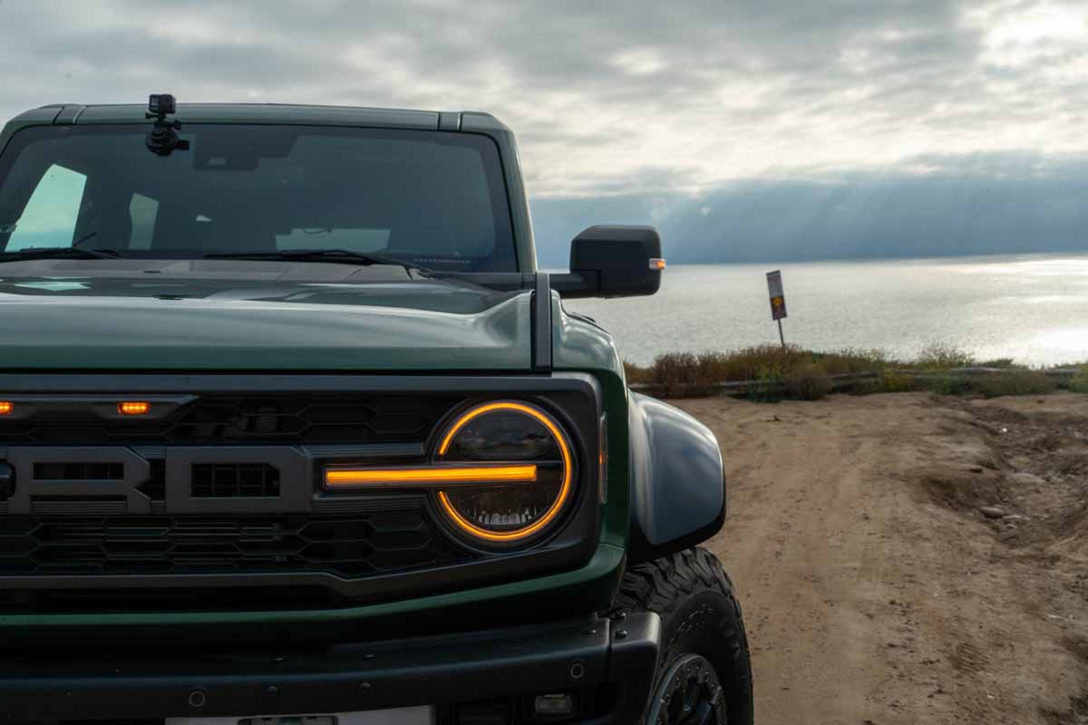 Ford Bronco Raptor headlight parking light amber on parked on cliff in San Diego