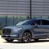 A 2023 Lincoln Corsair Grand Touring compact luxury SUV model parked on the plaza outside an office building