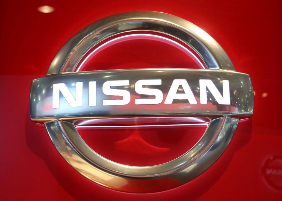 An illuminated Nissan corporate logo at the European Motor Show launched by Prince Philip of Belgium