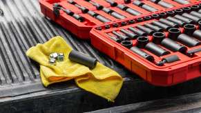 A set of tools on the bed of a reliable 2023 Ford F-150 pickup truck