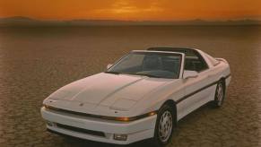 A front view of a white 1987 Toyota Supra