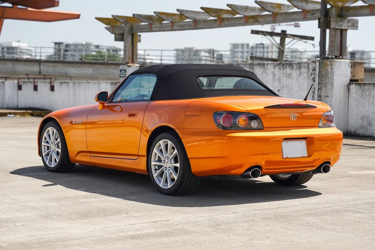 A rear view of the 2007 Honda S2000 in Imola Orange