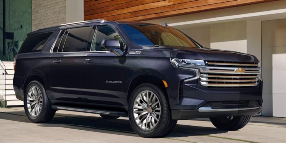 A black 2023 Chevrolet Tahoe full-size SUV is parked. 