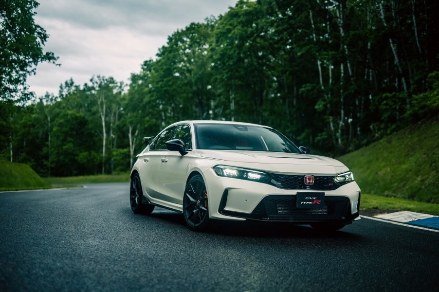 Some cars offer a manual transmission as the only option, like this white 2023 Honda Civic Type R, a popular option for millennials.