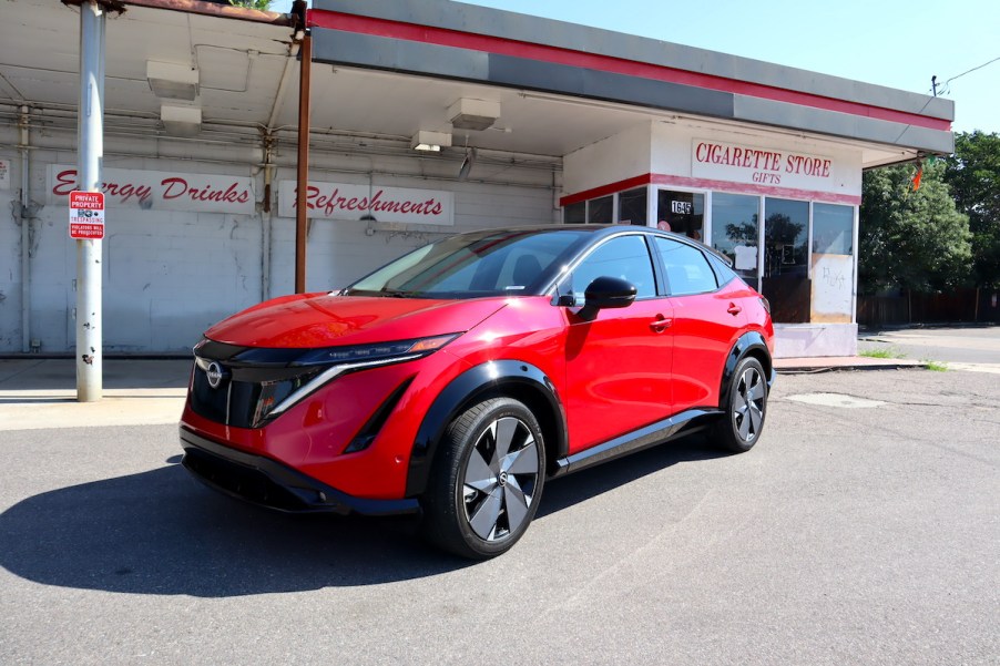 A front view of the 2023 Nissan Ariya at an abandon gas station