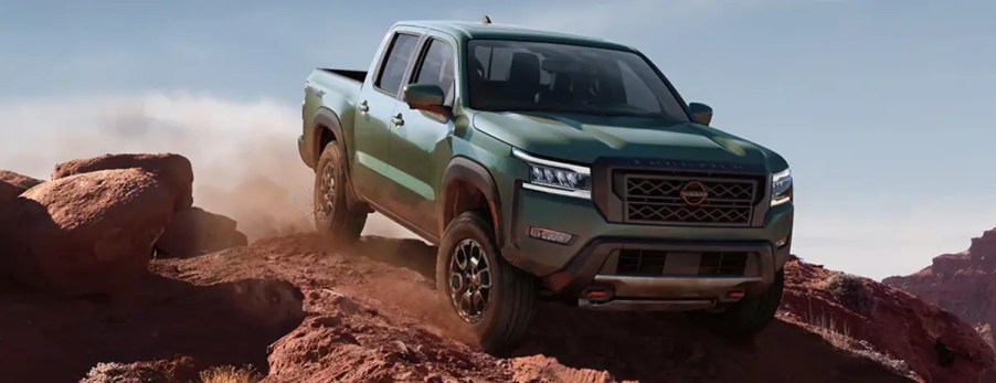 Green 2023 Nissan Frontier in outdoor setting