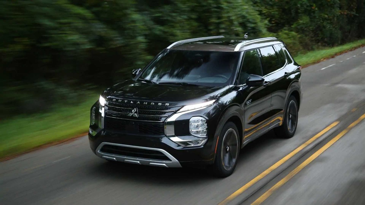 Black 2024 Mitsubishi Outlander on the road