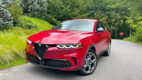 The 2024 Alfa Romeo Tonale parked near foliage