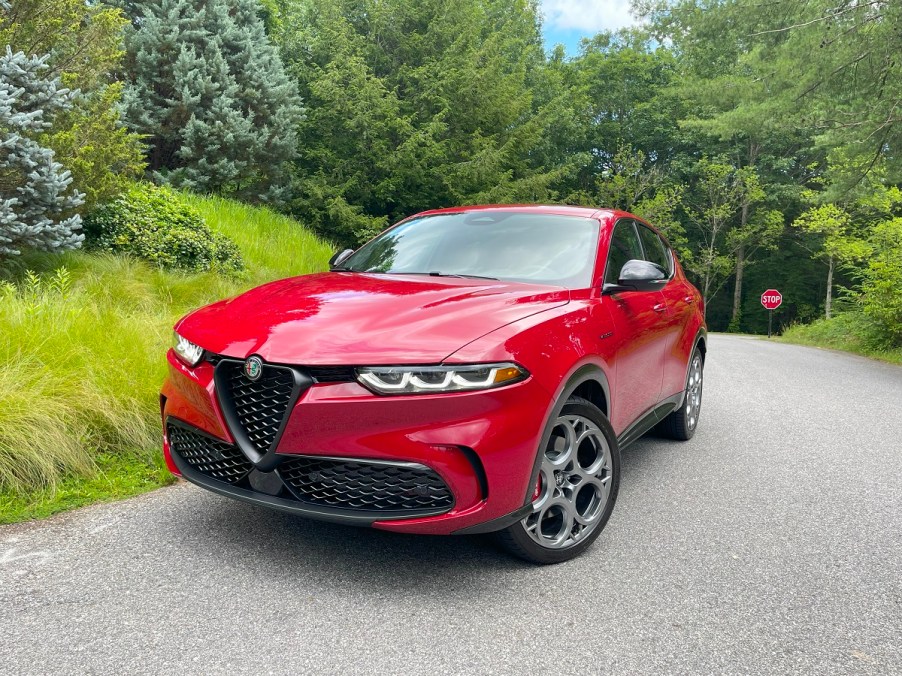 The 2024 Alfa Romeo Tonale parked near foliage