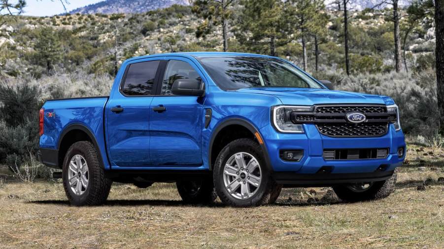 The 2024 Ford Ranger parked while off-roading in sand