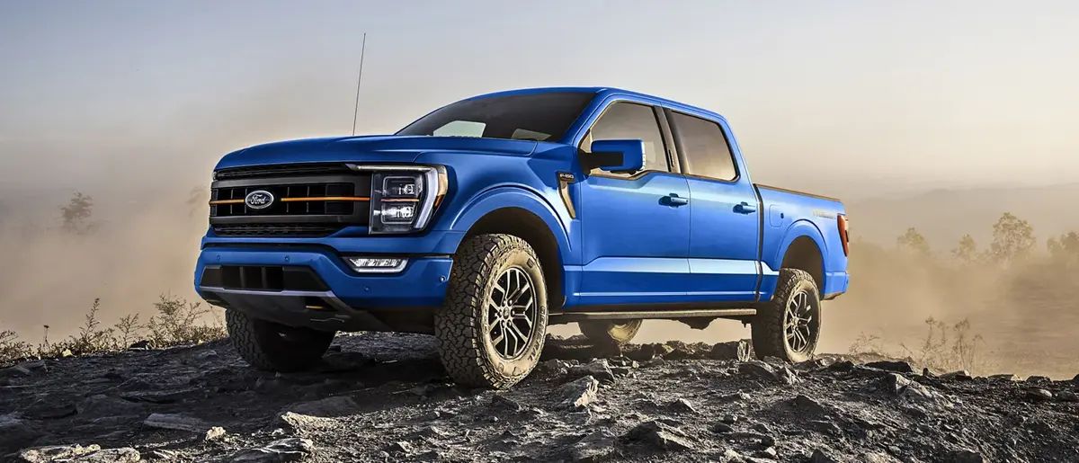 Blue 2023 Ford F-150 on rocks