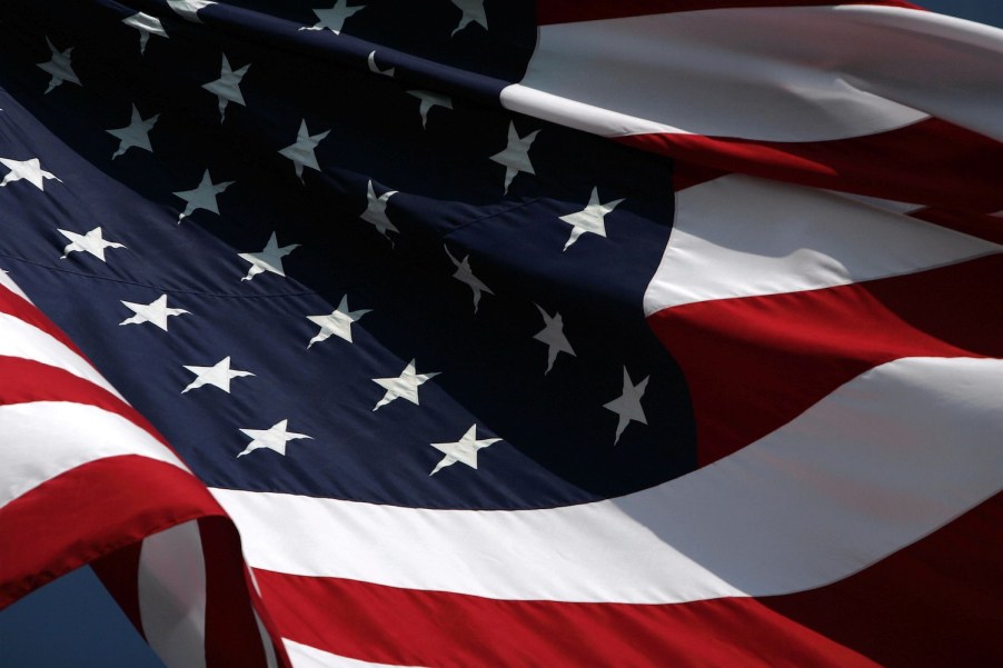 Closeup of the stars and stripes on an American flag.