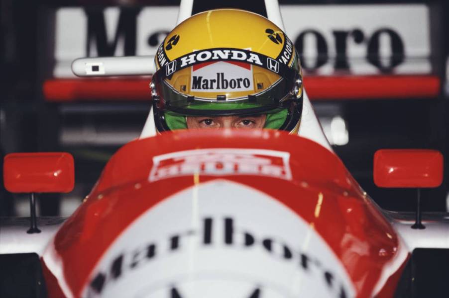 Ayrton Senna in his car before a race.