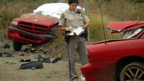 Red 2002 Ram truck accident with Camaro