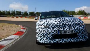 A teaser image of the 2024 Hyundai Ioniq 5 N small electric SUV on a track.