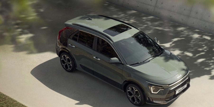 An aerial view of a green 2023 Kia Niro Hybrid subcompact SUV.