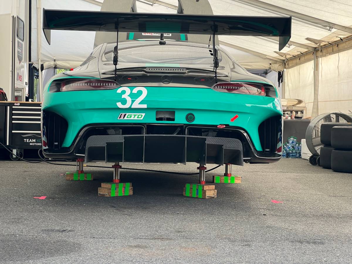 A Mercedes-AMG GT racecar in the garage