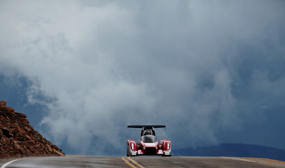 A modified Mitsubishi racecar racing the Pikes Peak Hill Climb