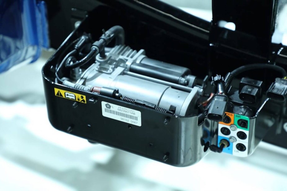 A close up view of the Ram air suspension compressor.