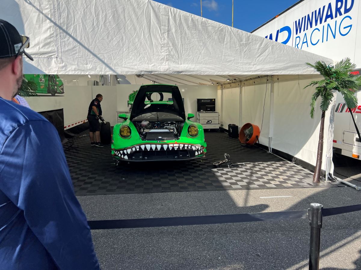 A T-Rex painted Porsche 911 race car