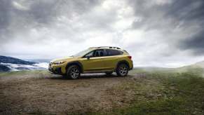 A 2023 Subaru Crosstrek on a hill