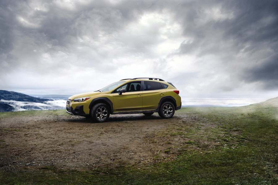 A 2023 Subaru Crosstrek on a hill