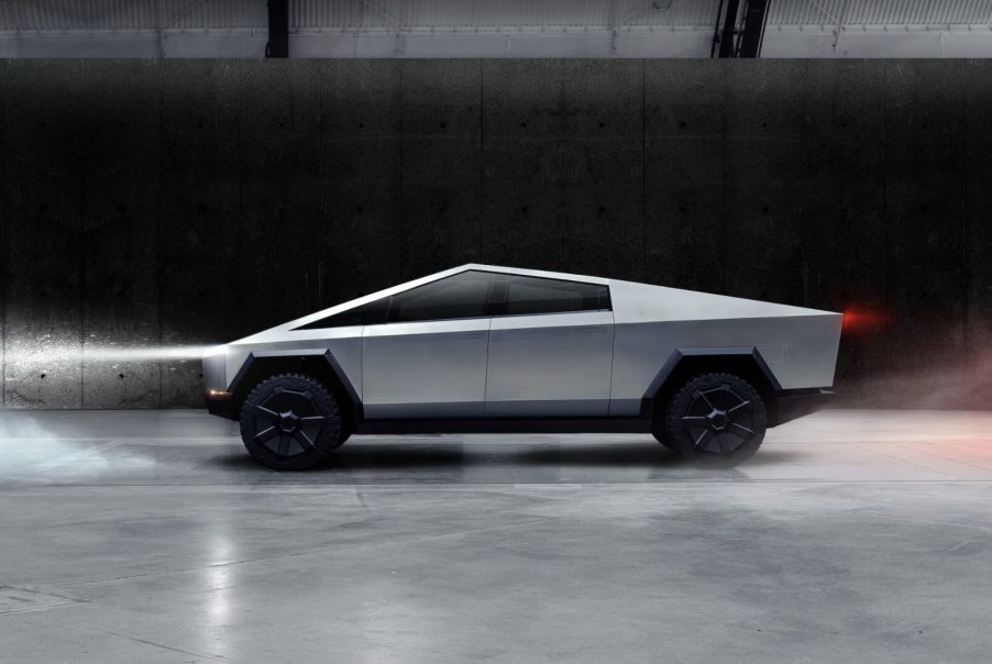 A side view of the Tesla Cybertruck on a stage