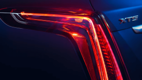 A closeup shot of the 2024 Cadillac XT5's rear headlight design and model badging