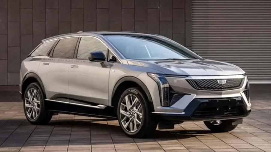 Silver 2024 Cadillac Optiq EV SUV on bricks