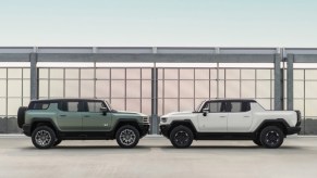 Two 2023 GMC Hummer EV SUV face to face