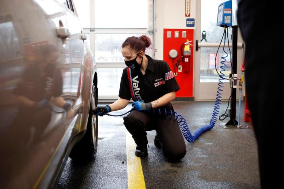 A tire pressure check on a vehicle at a Valvoline Instant Oil Change station in Indianapolis, Indiana