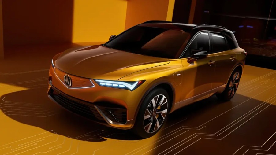 Bright gold 2024 Acura ZDX EV SUV on gold background