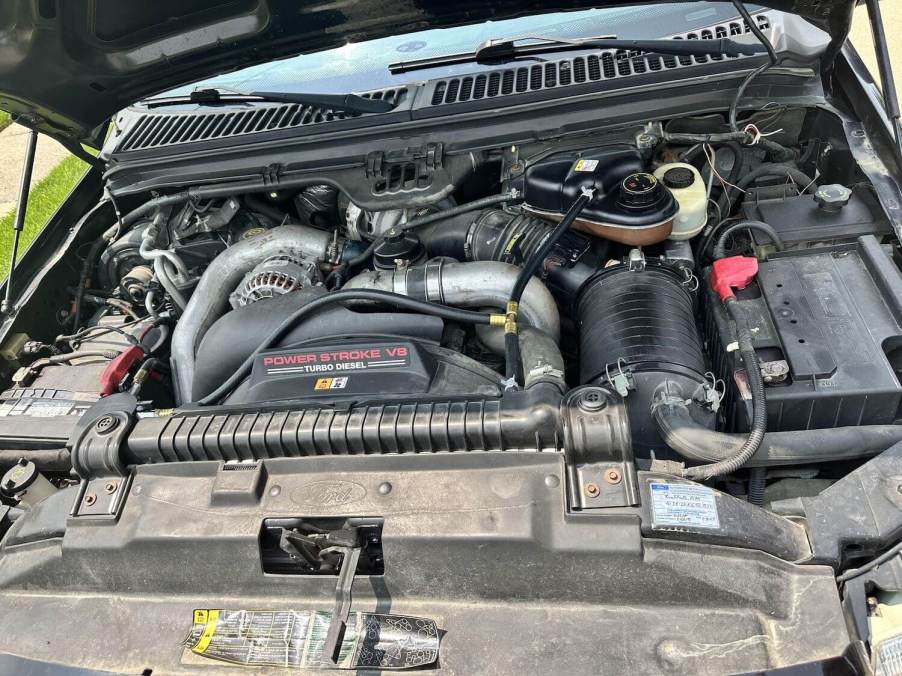 The engine bay of a 2004 Ford Super Duty with a 6.0-liter Power Stroke V8 engine.