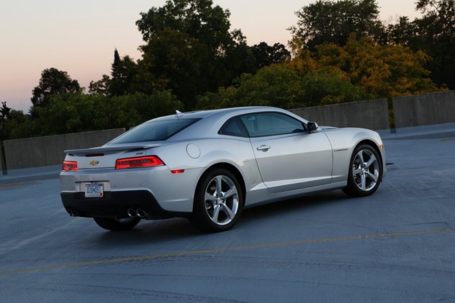 A silver 2014 Chevrolet Camaro shows off its rear-end styling.