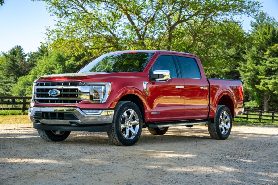 The 2023 Ford F-150 parked near a farm