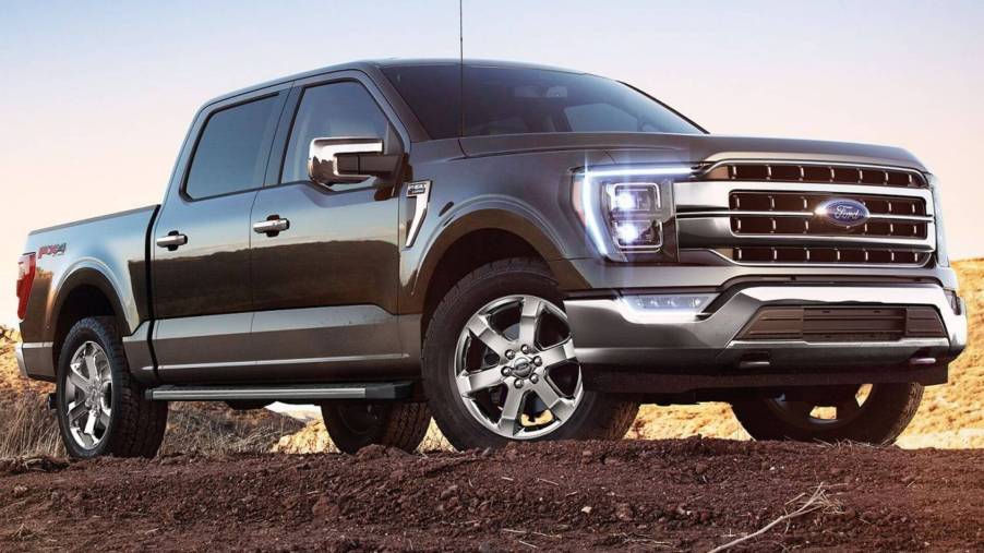 The 2023 Ford F-150 PowerBoost Hybrid off-roading in dirt