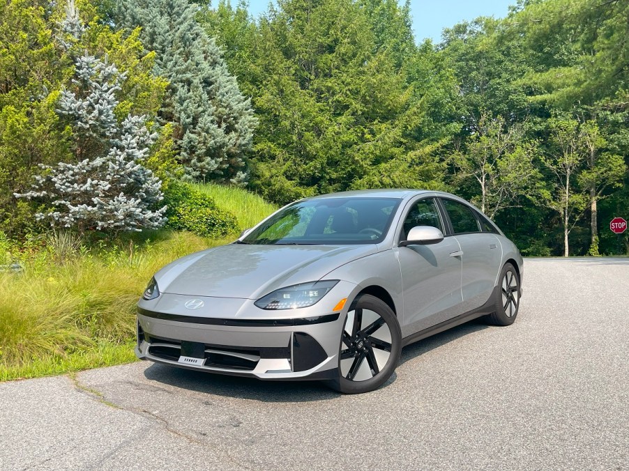 The 2023 Hyundai Ioniq 6 parked near foliage