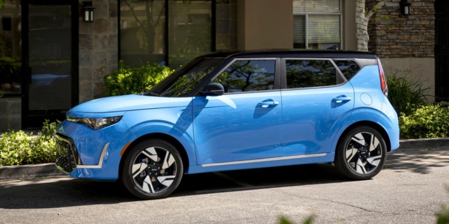 The side of a blue 2023 Kia Soul subcompact SUV.