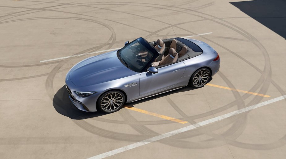 Birds-eye view of a silver Mercedes-Benz convertible with a tan interior.