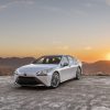 A white 2023 Toyota Mirai parked on a cliff at sunset. This Toyota SUV is off to a rough start in sales this year.