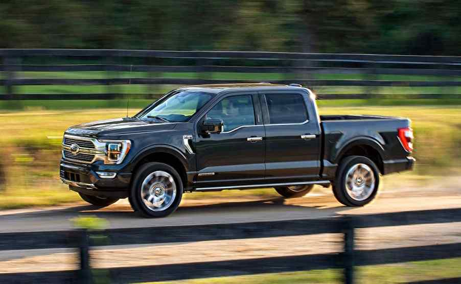 The 2023 Ford F-150 driving down the road