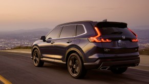 2023 Honda CR-V – a RAV4 competitor – posted driving off into the sunset.