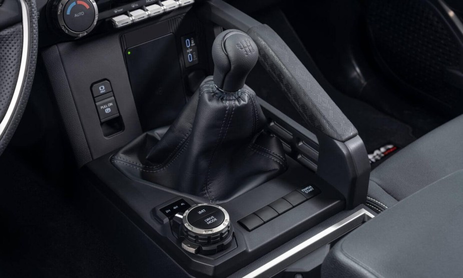 Closeup of the stickshift lever in a Toyota Tacoma.