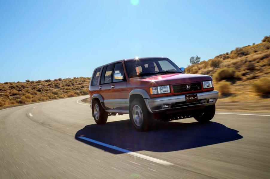 The Acura SLX full-size SUV (a rebadged Isuzu Trooper) model with Super Handling AWD driving on a desert road