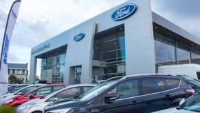 Ford cars on display outside a dealership.