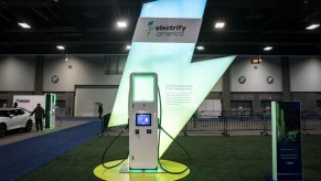 Electrify America EV charging station lit up at night