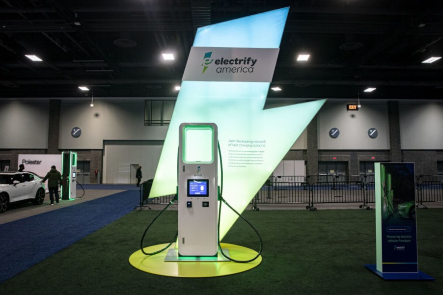 Electrify America EV charging station lit up at night