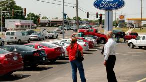 Car buyer and salesman at dealership