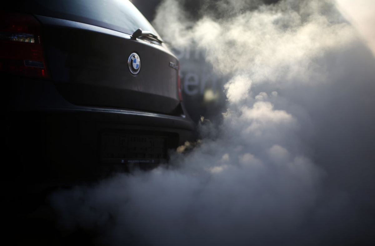 Gray exhaust smoke from a BMW